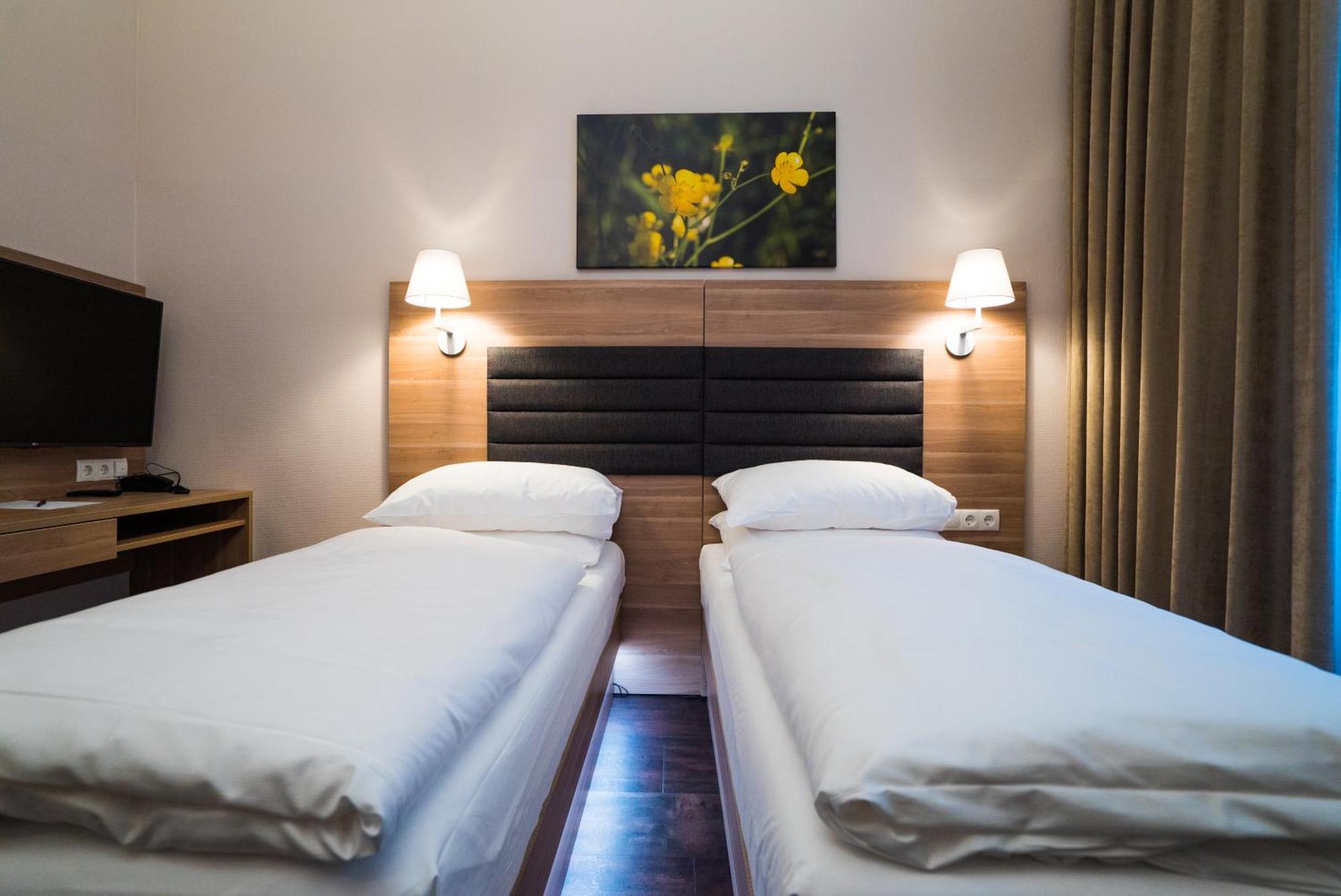 Doppel- oder Zweibettzimmer